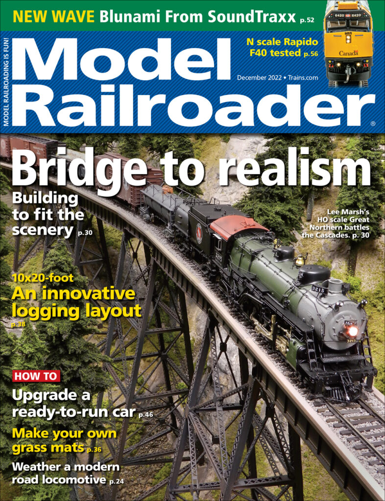 Cover of Model Railroader Magazine with steam engine going over bridge