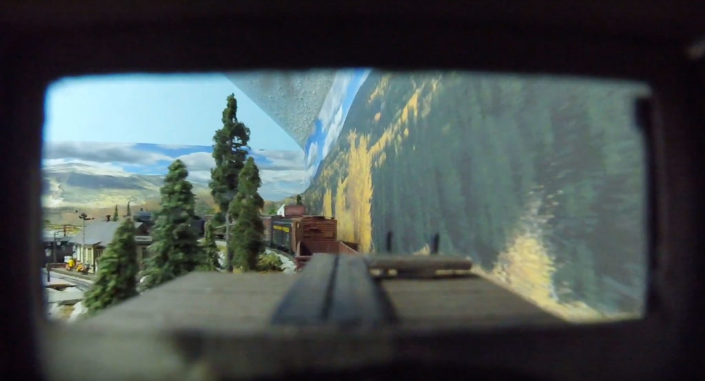 Caboose view of model railroad