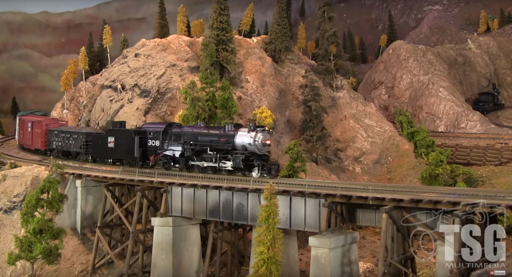Model locomotive on trestle