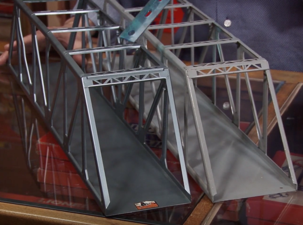 Metal toy train bridges.