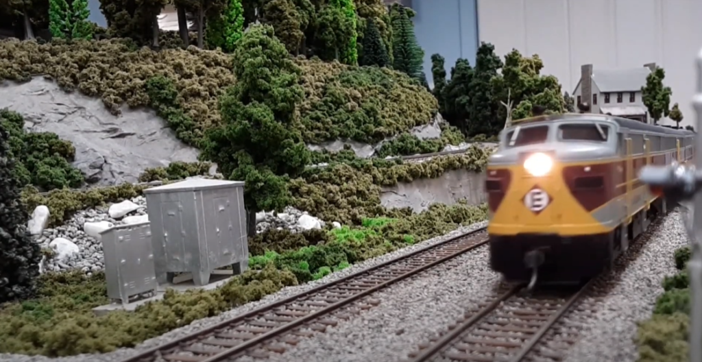 HO scale passenger train on layout