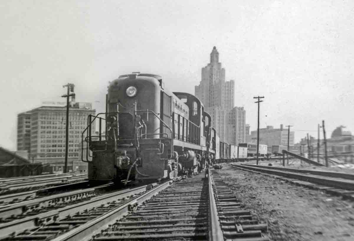 Diesel locomotives on freight train in urban area