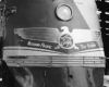 Streamlined diesel locomotive with metal emblem attached to nose