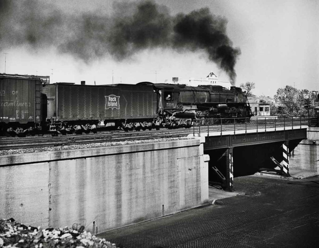 Steam locomotive with freight train