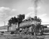 Steam locomotive with passenger train