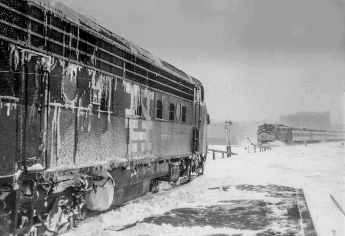 Passenger trains meet in snow