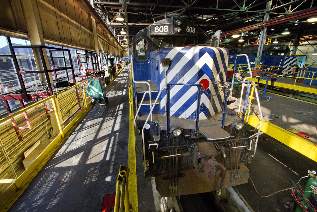 A train parked inside a shop 