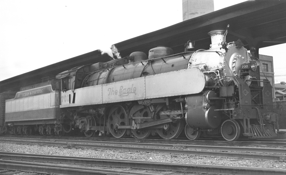 A train sitting outside a station