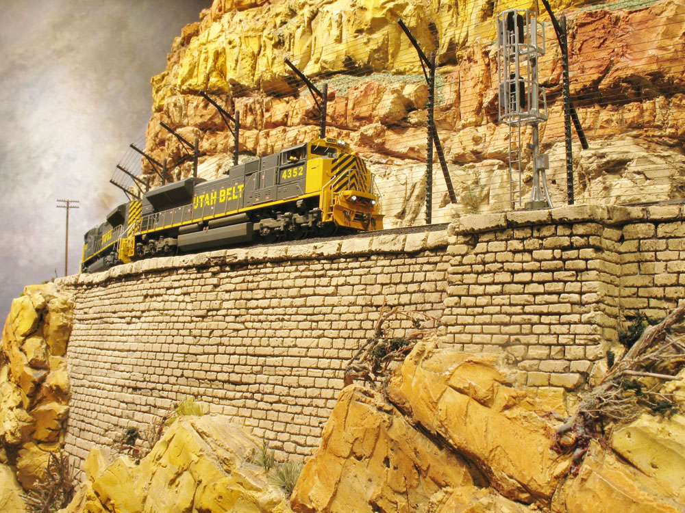 Train traveling along a mountain