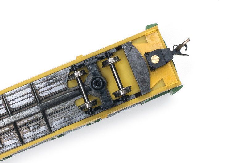 The underside of a model freight car