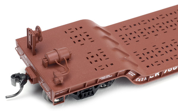 The ExactRail depressedcenter flatcar has a separately applied brake wheel and stand main reservoir piping and triple valvepg