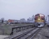 Two passenger trains on diverging tracks