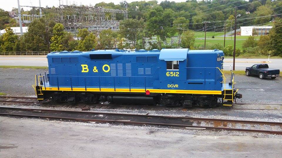 Road-switcher in blue paint with yellow lettering and trim