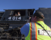 A picture of Brian Schmidt taking a picture of the conductor sitting in Big Boy