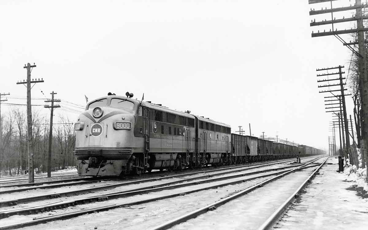 Diesel locomotives on freight train in snow