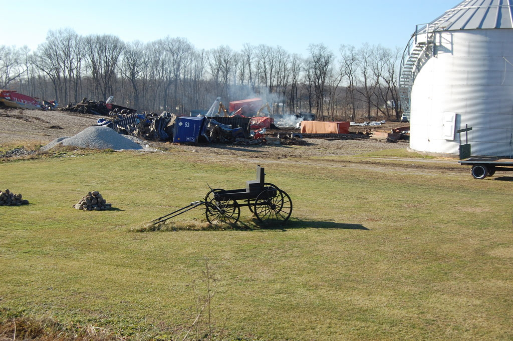 A distant shot of derailed trains