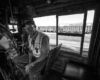 A Big Boy conductor sitting inside the train