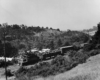 Electric locomotive on freight train in hills