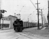 Electric locomotive on freight train in street