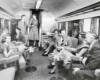 Passengers in a lounge car