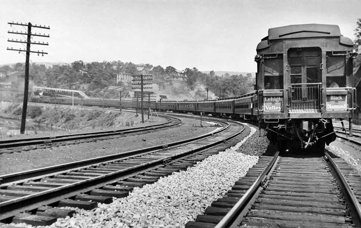 A black and white picture of the back of a caboose