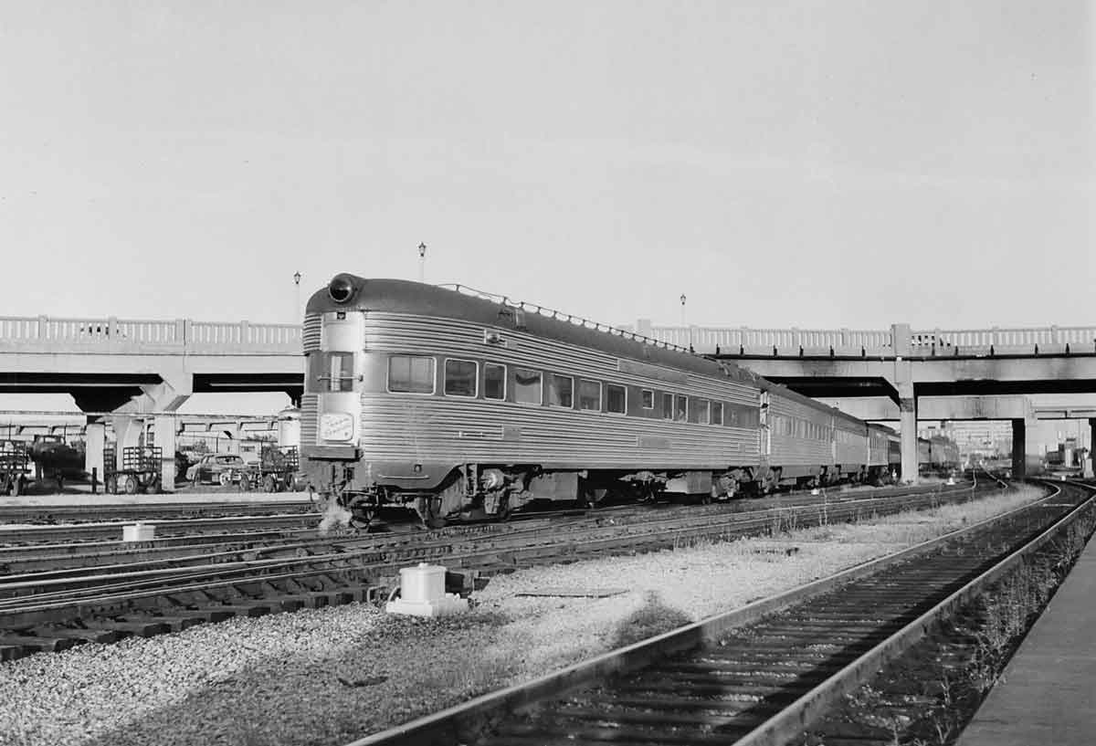 an observation car at the end of a passenger train