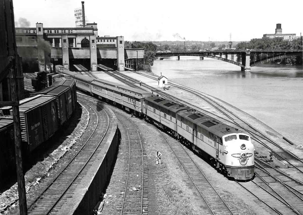 a passenger train leaving a train station