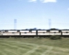 Diesel locomotives haul a passenger train.