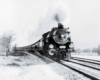 a steam engine pulling passenger cars