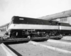 a streamliner sitting outside a shop