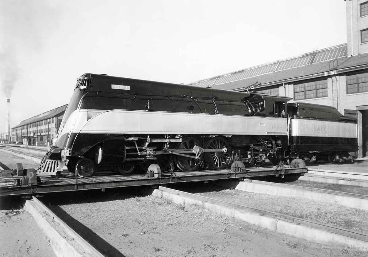 a streamliner sitting outside a shop