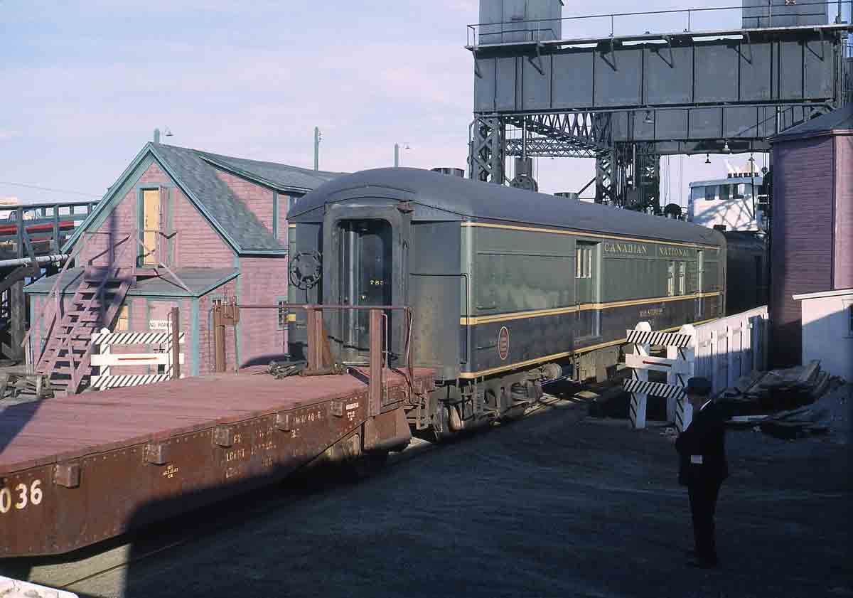 a passenger car getting rolled onto a ferry