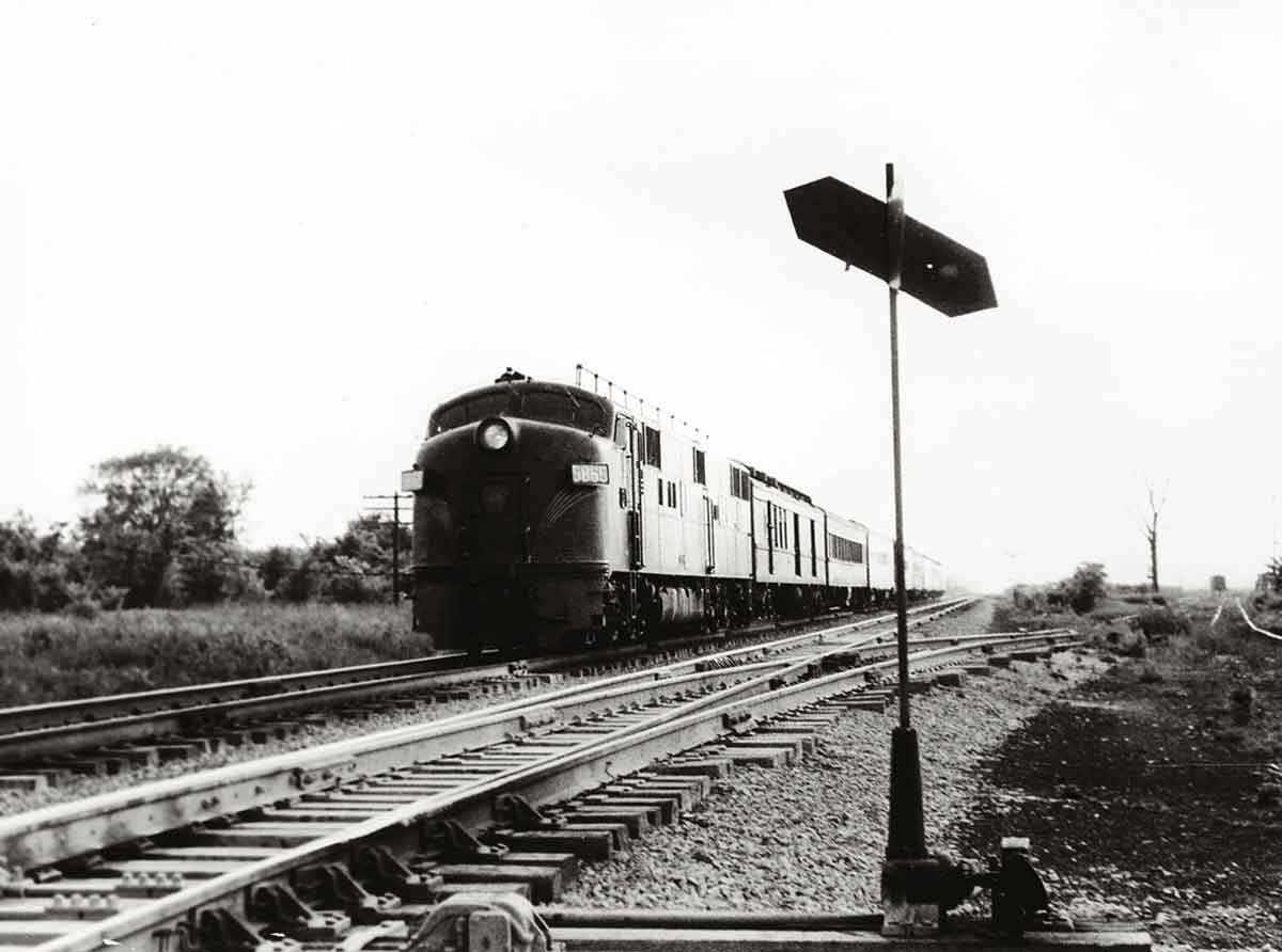 A train approaching a stop light