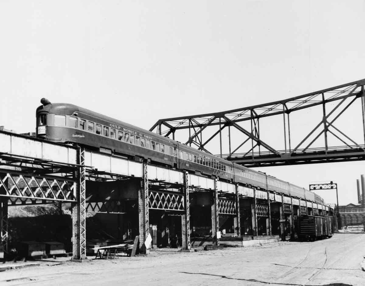 a passenger train on a bridge