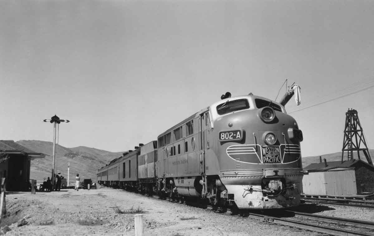 A diesel pulling passenger cars