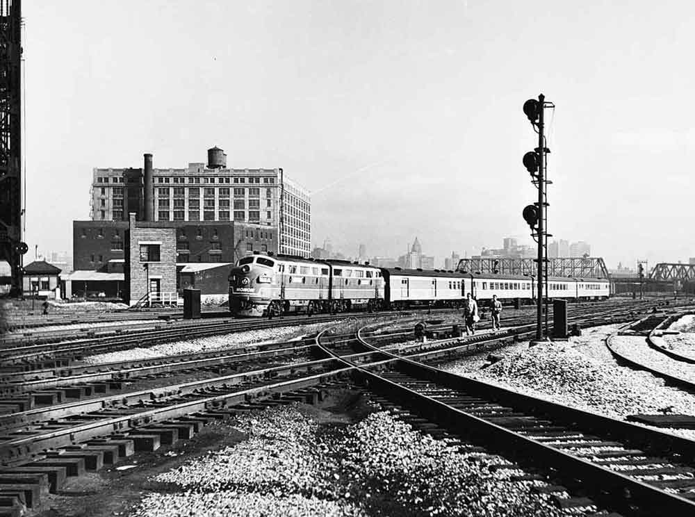 A diesel pulling passenger cars