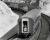 Sign reading Adios on rear of passenger train