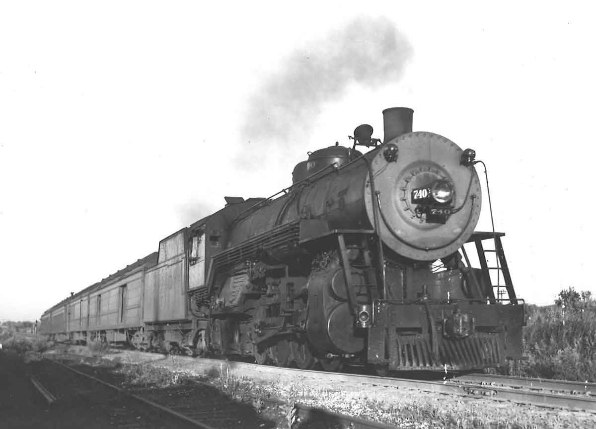 A black and white close up shot of a train