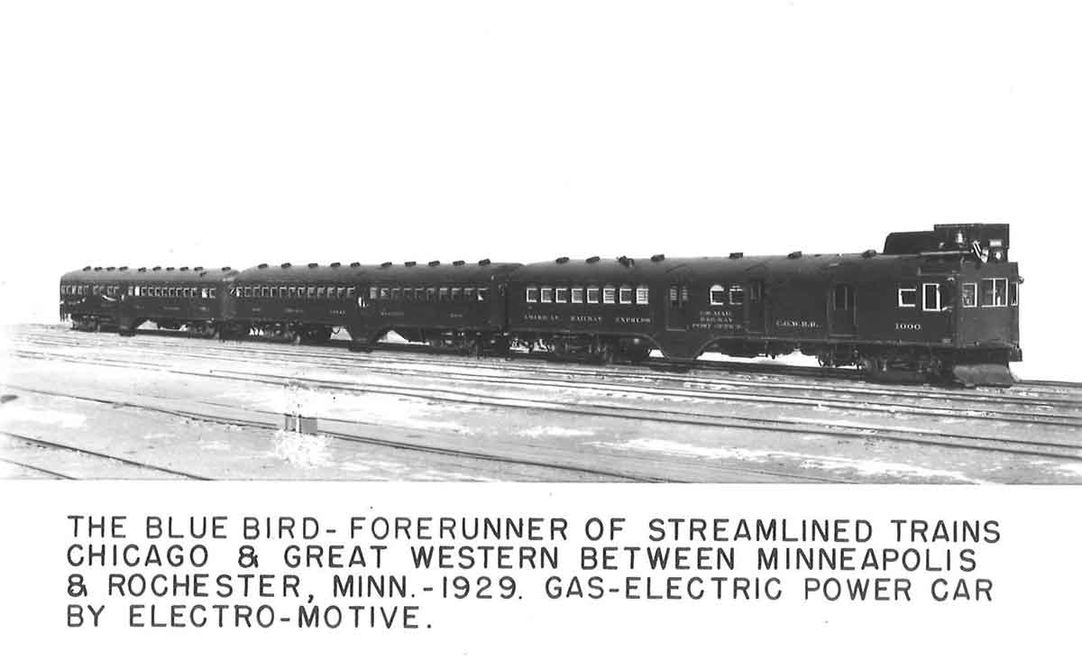 A black and white distant shot of a train