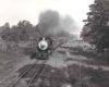 A black and white photo of the locomotive 4-6-0 416 on the tracks