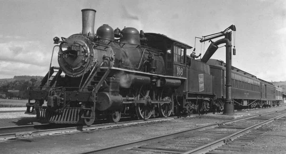 Steam locomotive by water spout