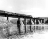 Diesel powered passenger train on bridge
