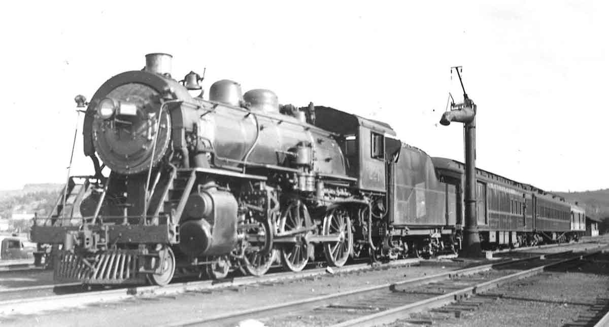 Steam locomotive by water spout