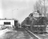 Diesel hauled passenger train at modern station