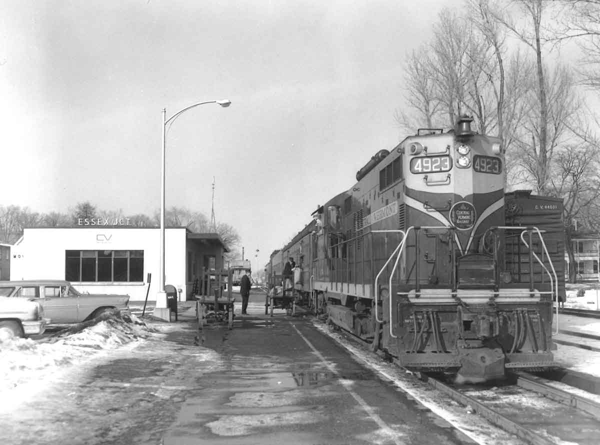 Diesel hauled passenger train at modern station