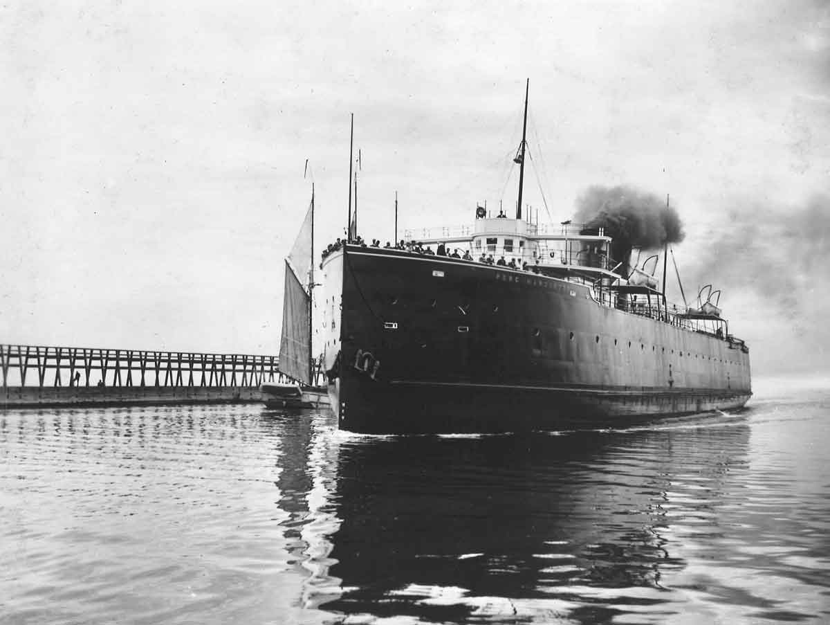 A car ferry traveling across the water