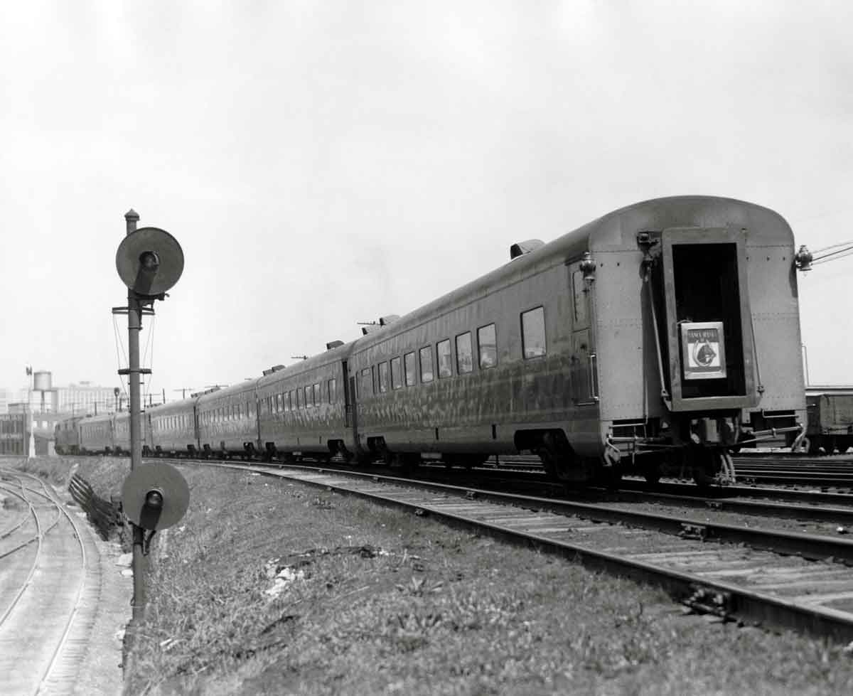 Rear of passenger train passing signal