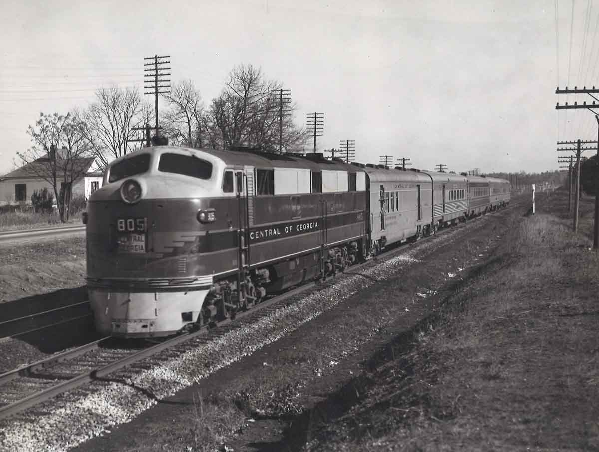 Diesel locomotive with five passenger cars
