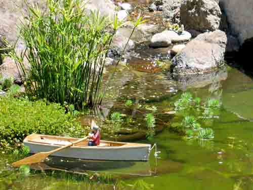 model boat on a pond