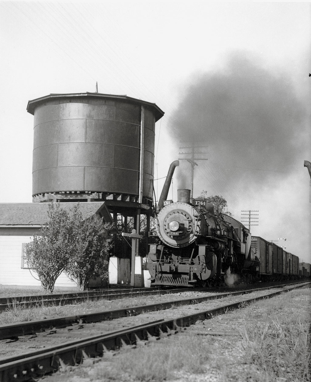 A train passing a water tower